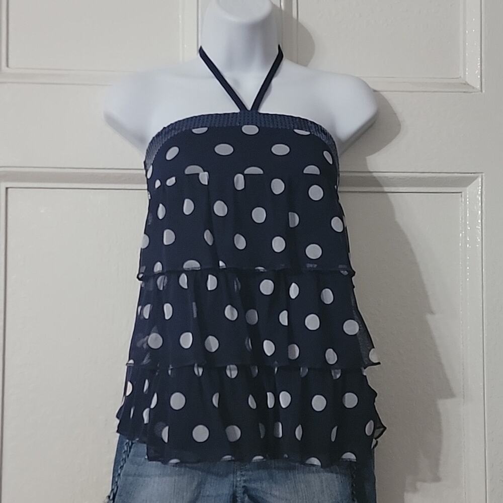 Girl's Sleeveless Polka-dot top w/ Sequin edge & Ruffles. Ties at neck. Justice